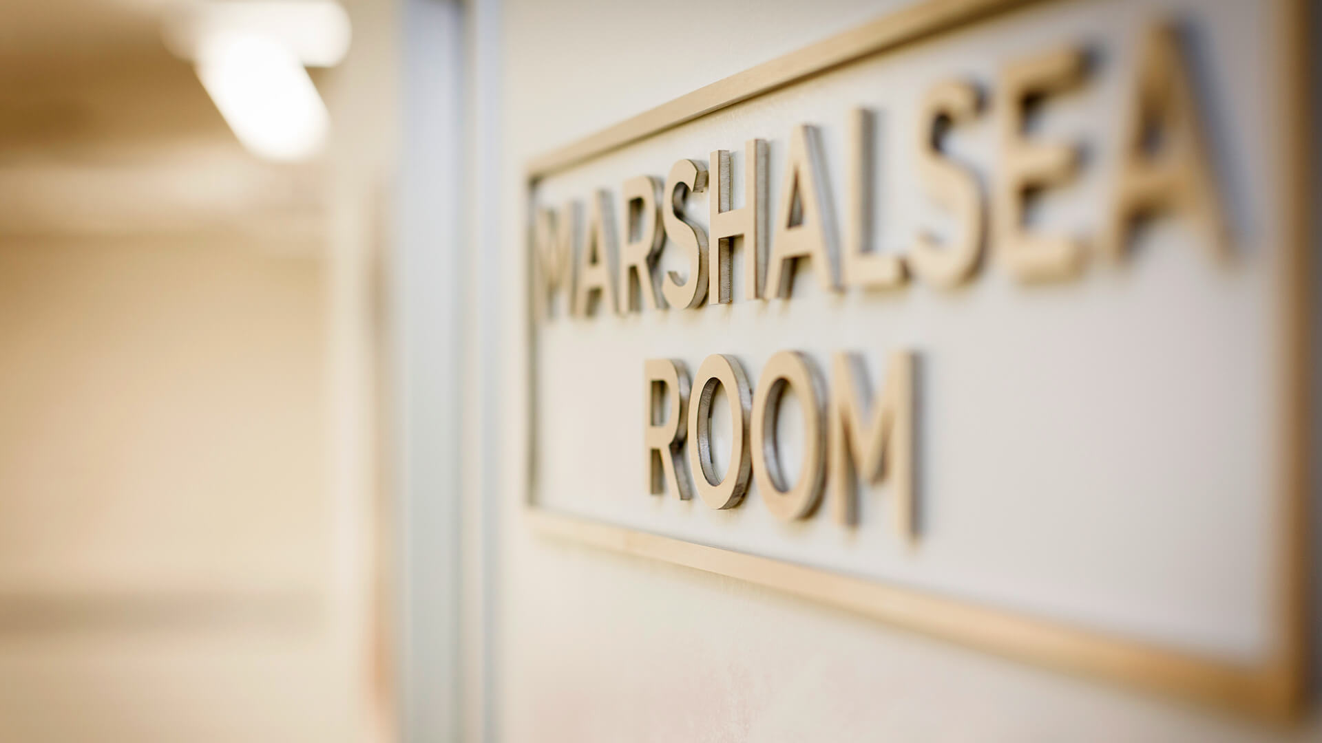 Close-up of a sign reading "Marshalsea Room"