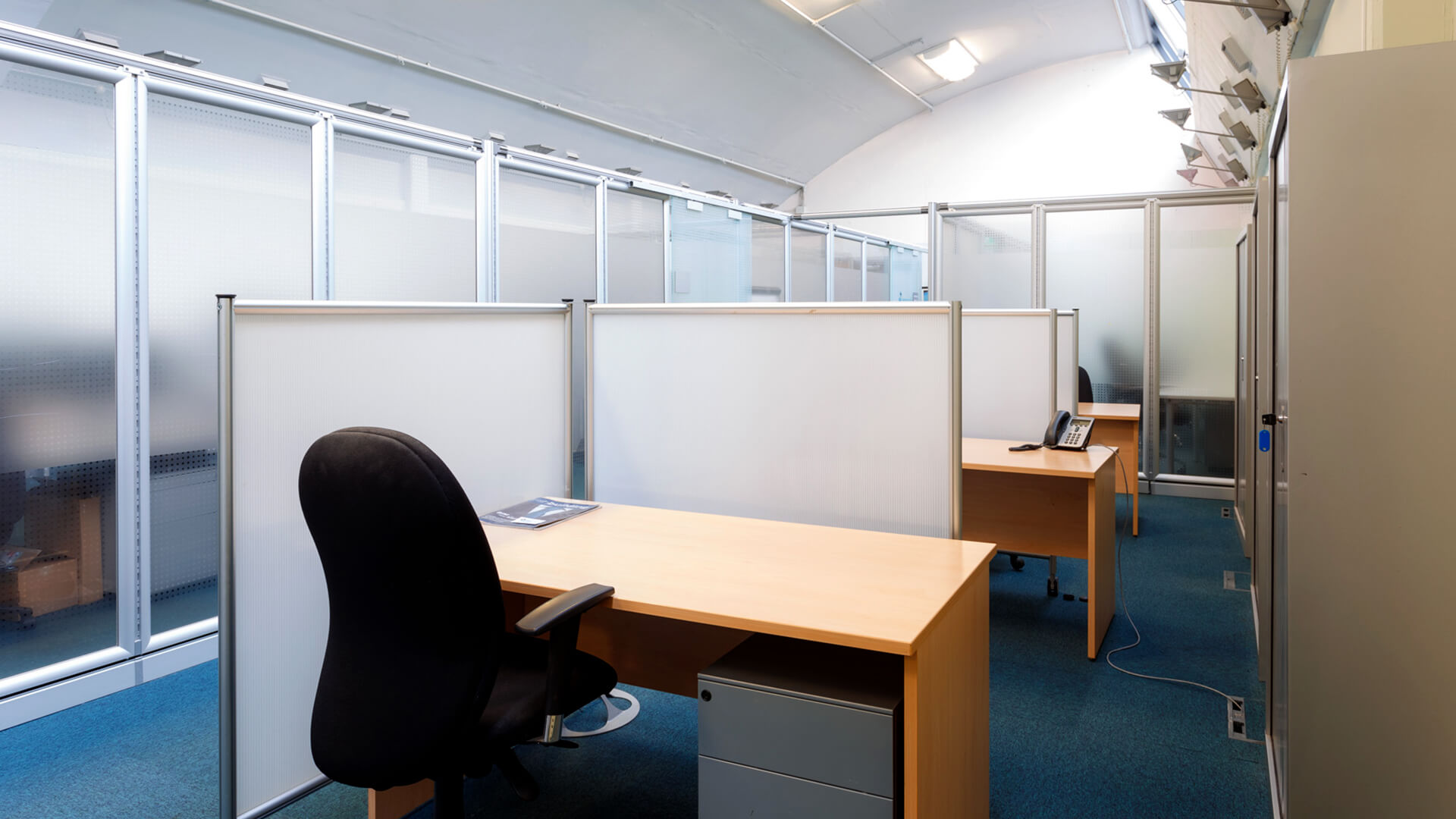 Desks arranged in one of the Digital Hub working spaces