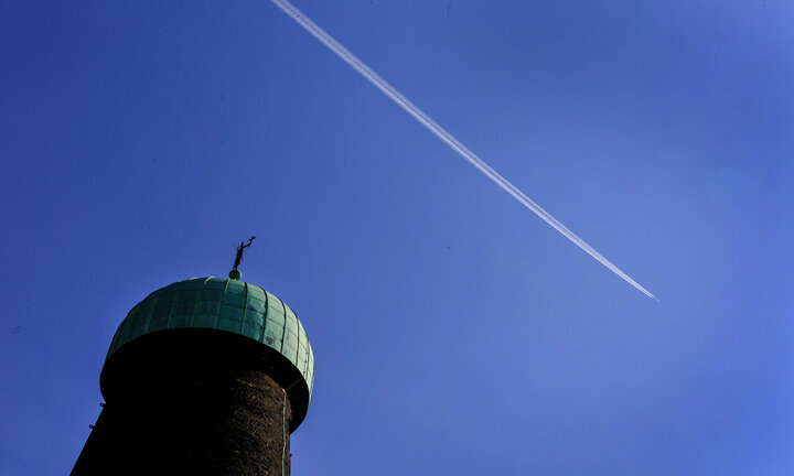 Picture of tip of St. Patrick's Tower with beautiful blue skies.